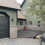 siding and stone veneer a good look